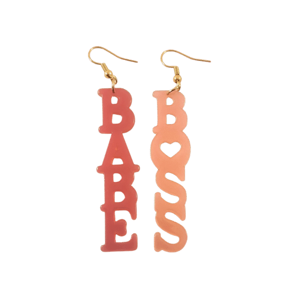 A pair of pink Boss Babe earrings—one reading “boss” and the other “babe”—styled in vibrant colors and playful design, ideal for confident women